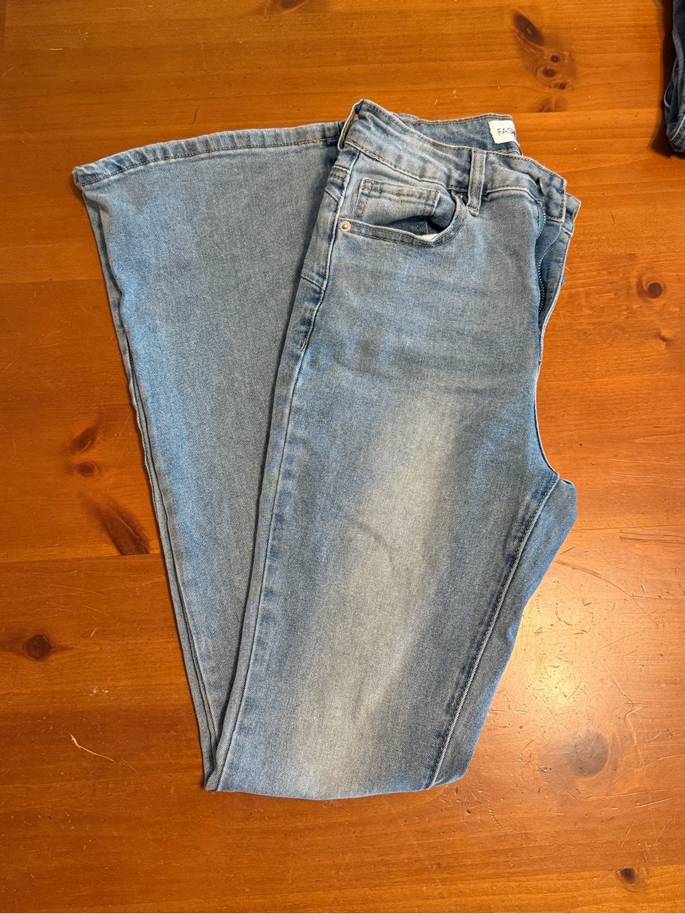 Fashion Nova Light Wash Blue Flared Jeans